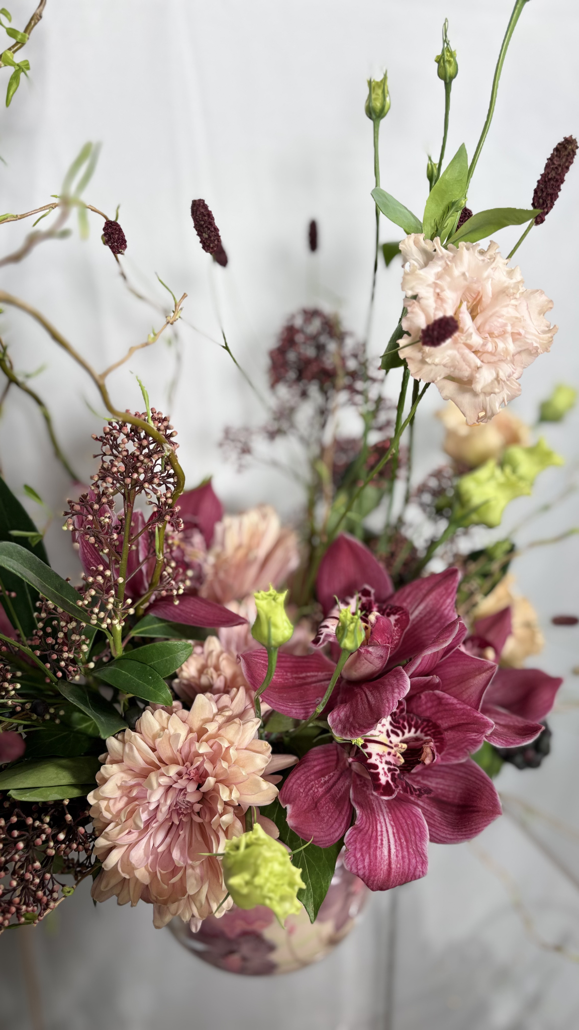 [UPDATE: Description of floral arrangement photo]